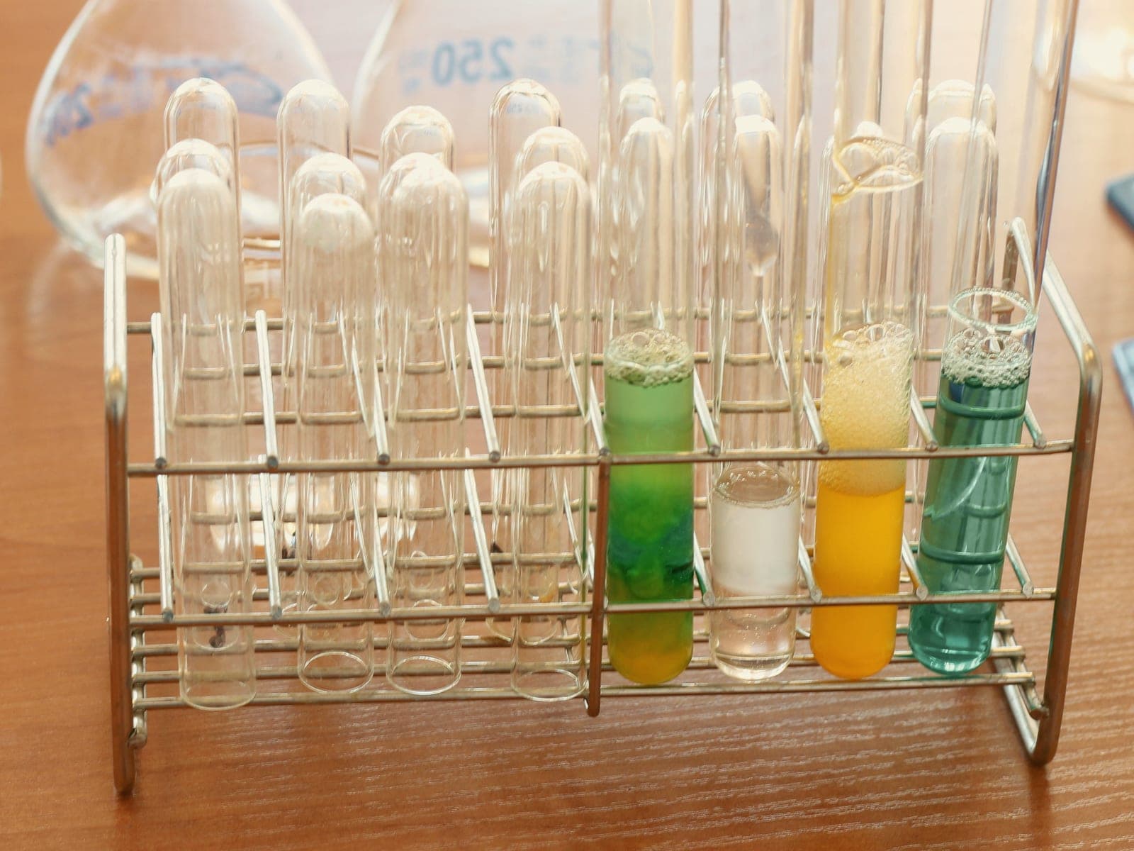 Test tubes in a rack on a laboratory bench